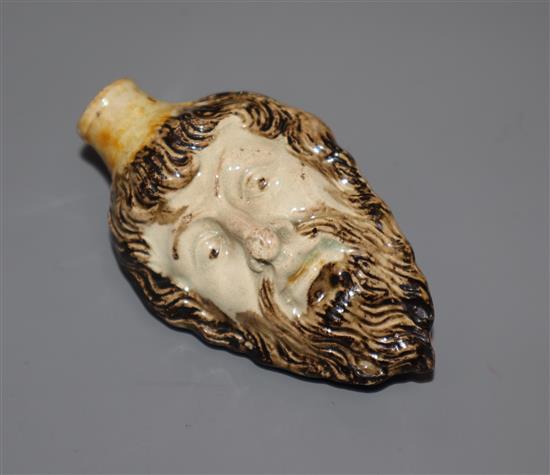 An 18th century Prattware mask scent bottle length 8cm